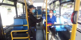 Mascarillas autobuses policía