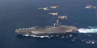 Cazas marroquíes y estadounidenses sobrevuelan el portaaviones nuclear estadounidense USS Eisenhower en las maniobras Lightning Handshake 2021