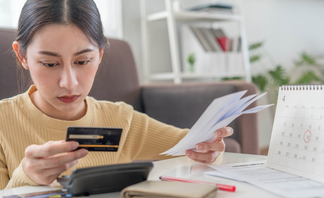 Women are stressed and headaches about credit card debt and large bills on hand. Housewives have trouble paying monthly water, electricity and telephone bills.